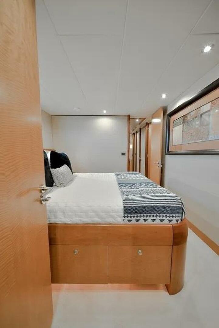 a bed in a room aboard CERCA TROVA Yacht for Sale
