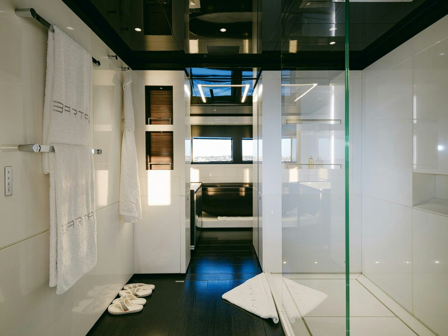 a room with a glass wall aboard BARTALI Yacht for Sale