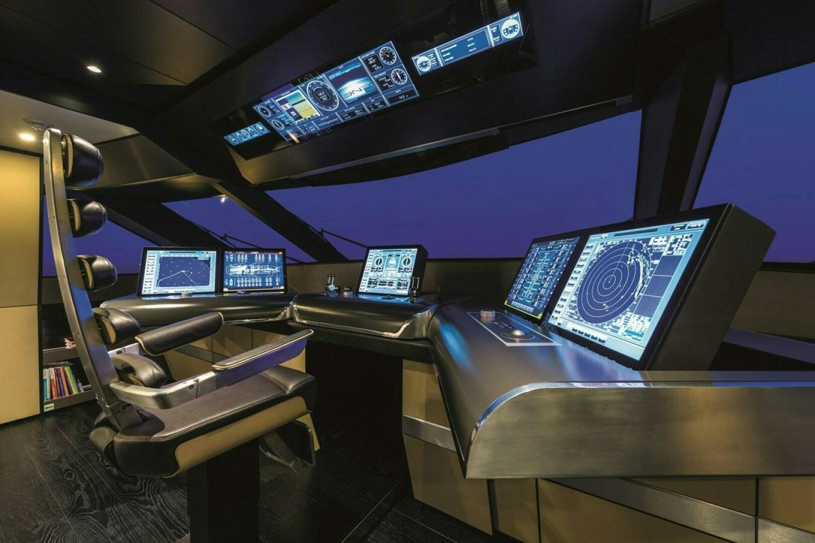 a room with computers and monitors aboard BARTALI Yacht for Sale