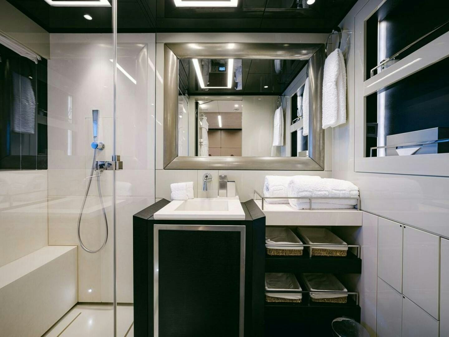 a bathroom with a sink and cabinets aboard BARTALI Yacht for Sale