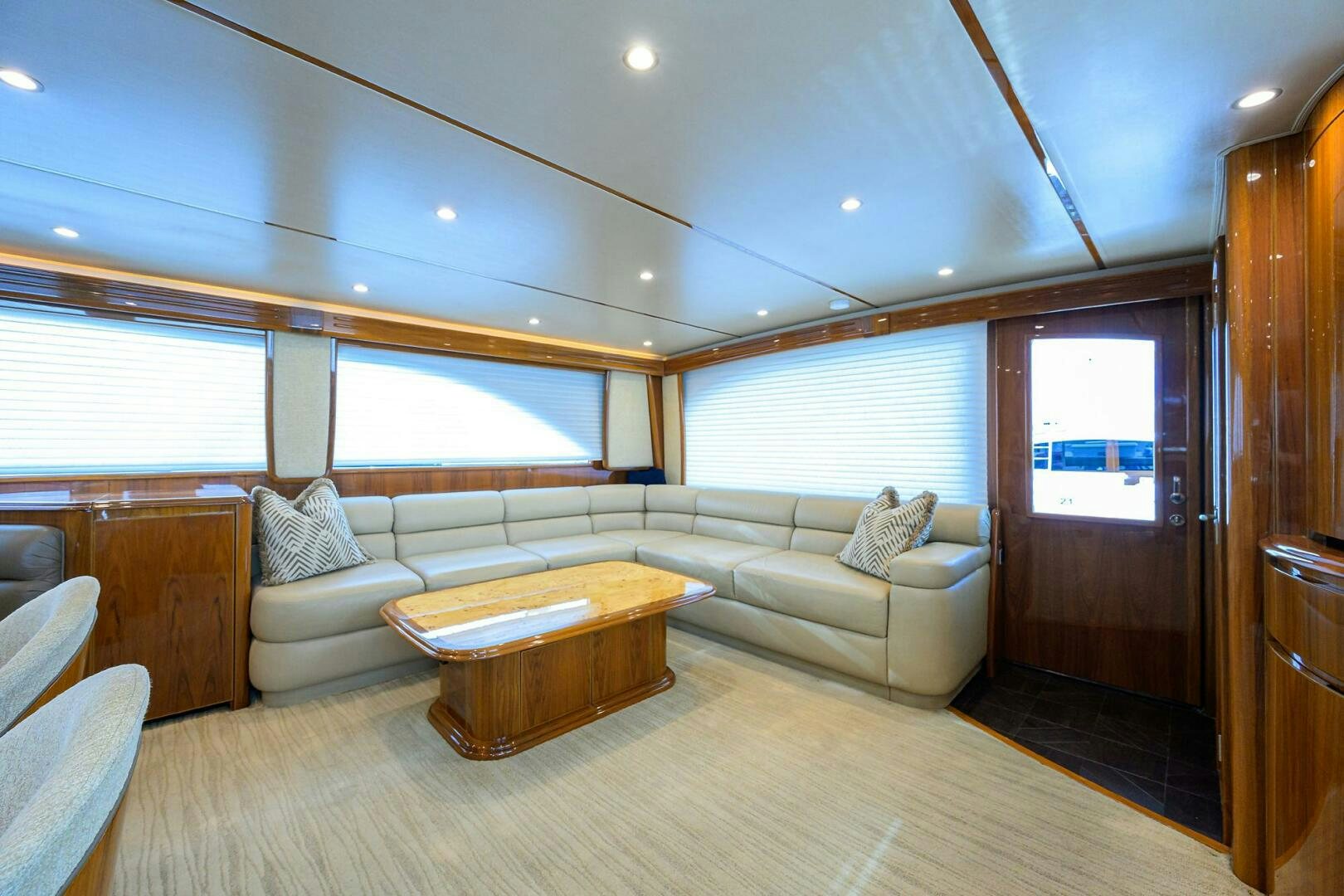 a living room with a couch and a table aboard JUST CHILLIN Yacht for Sale