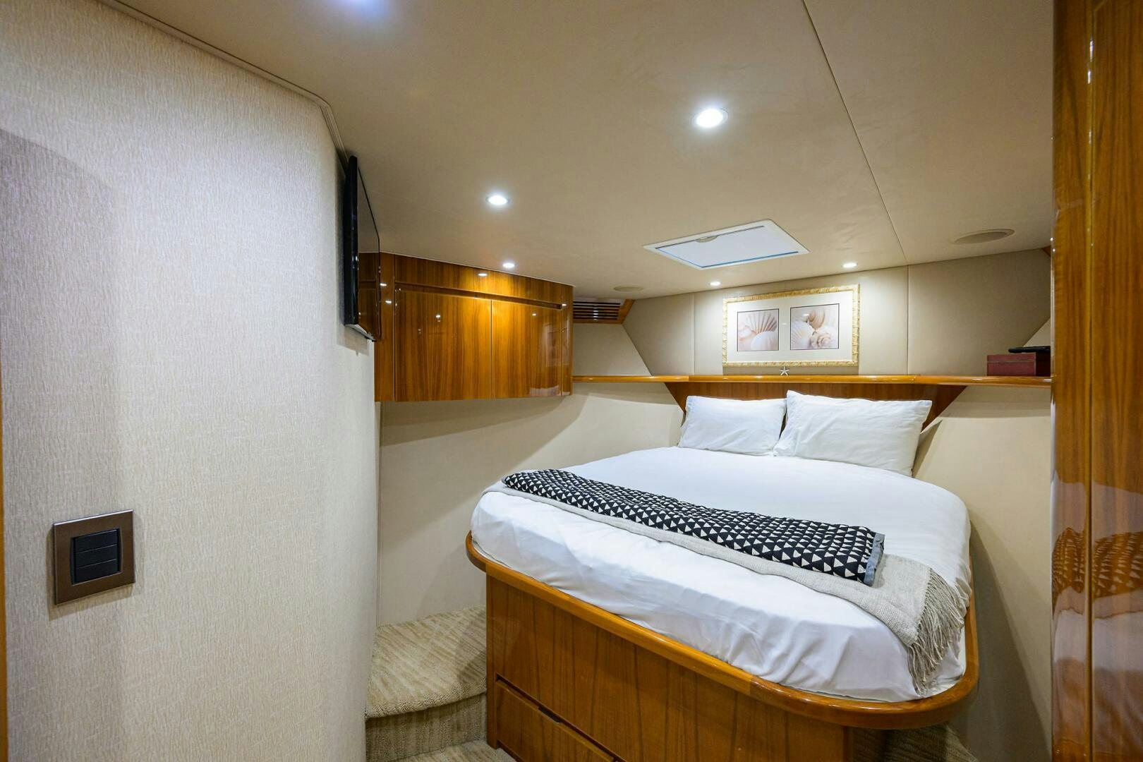 a bed with a white sheet aboard JUST CHILLIN Yacht for Sale
