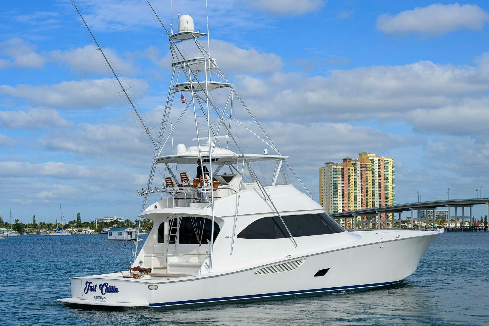 a white boat in the water aboard JUST CHILLIN Yacht for Sale