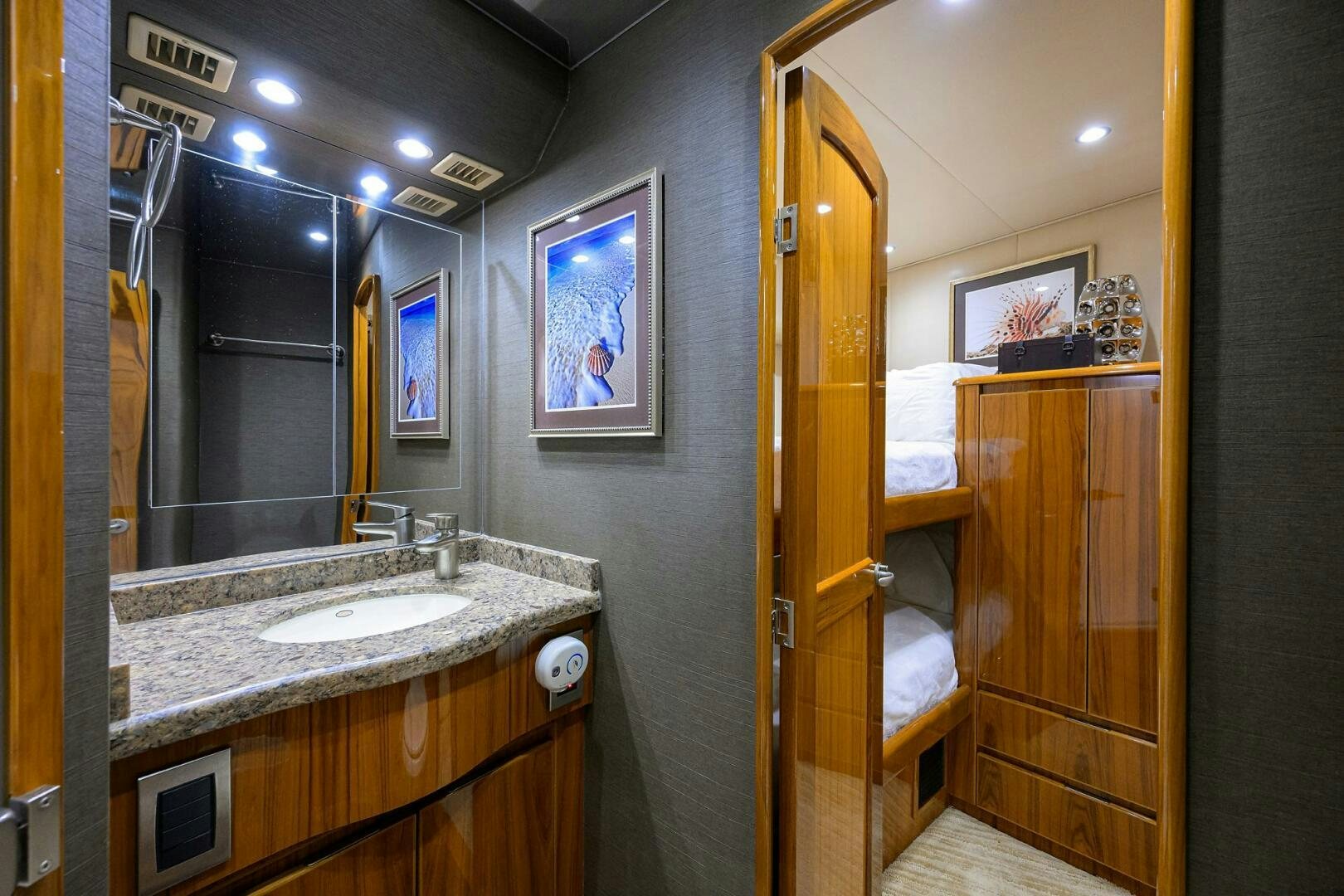 a bathroom with a sink and a mirror aboard JUST CHILLIN Yacht for Sale