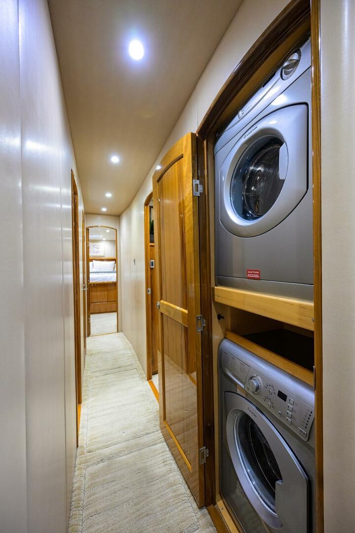 a hallway with a washing machine aboard JUST CHILLIN Yacht for Sale