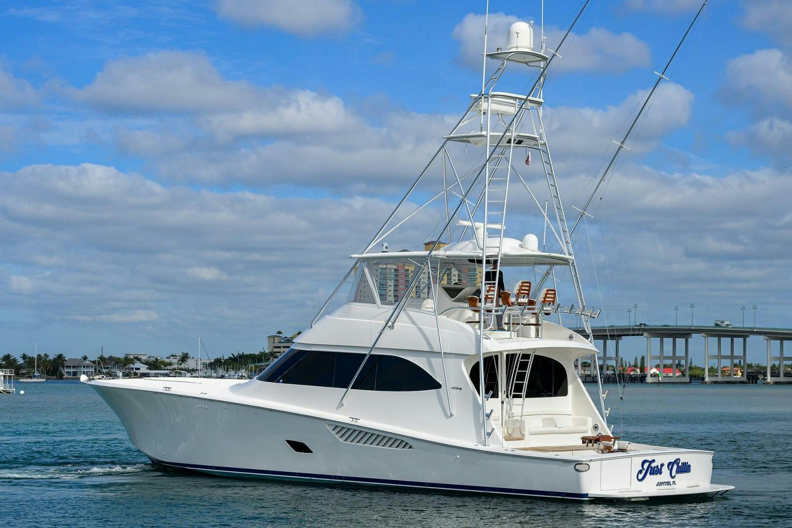 a white boat on the water aboard JUST CHILLIN Yacht for Sale