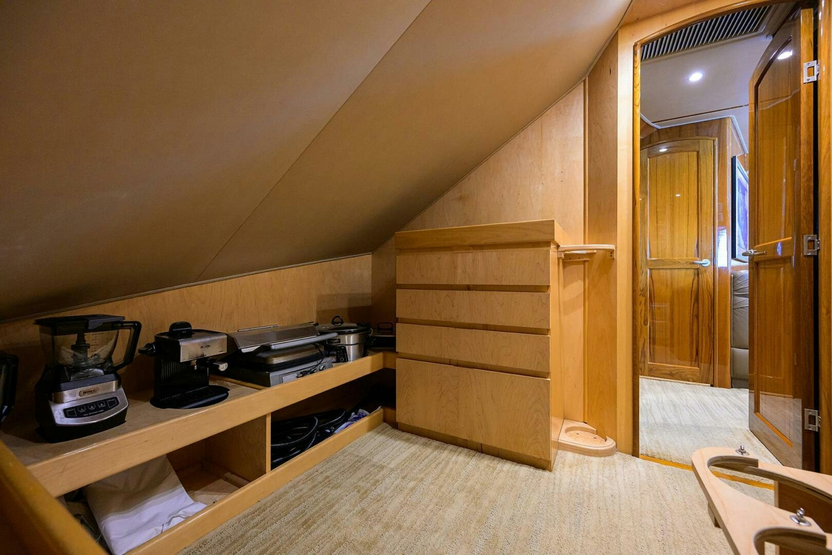 a room with a desk and a bed aboard JUST CHILLIN Yacht for Sale