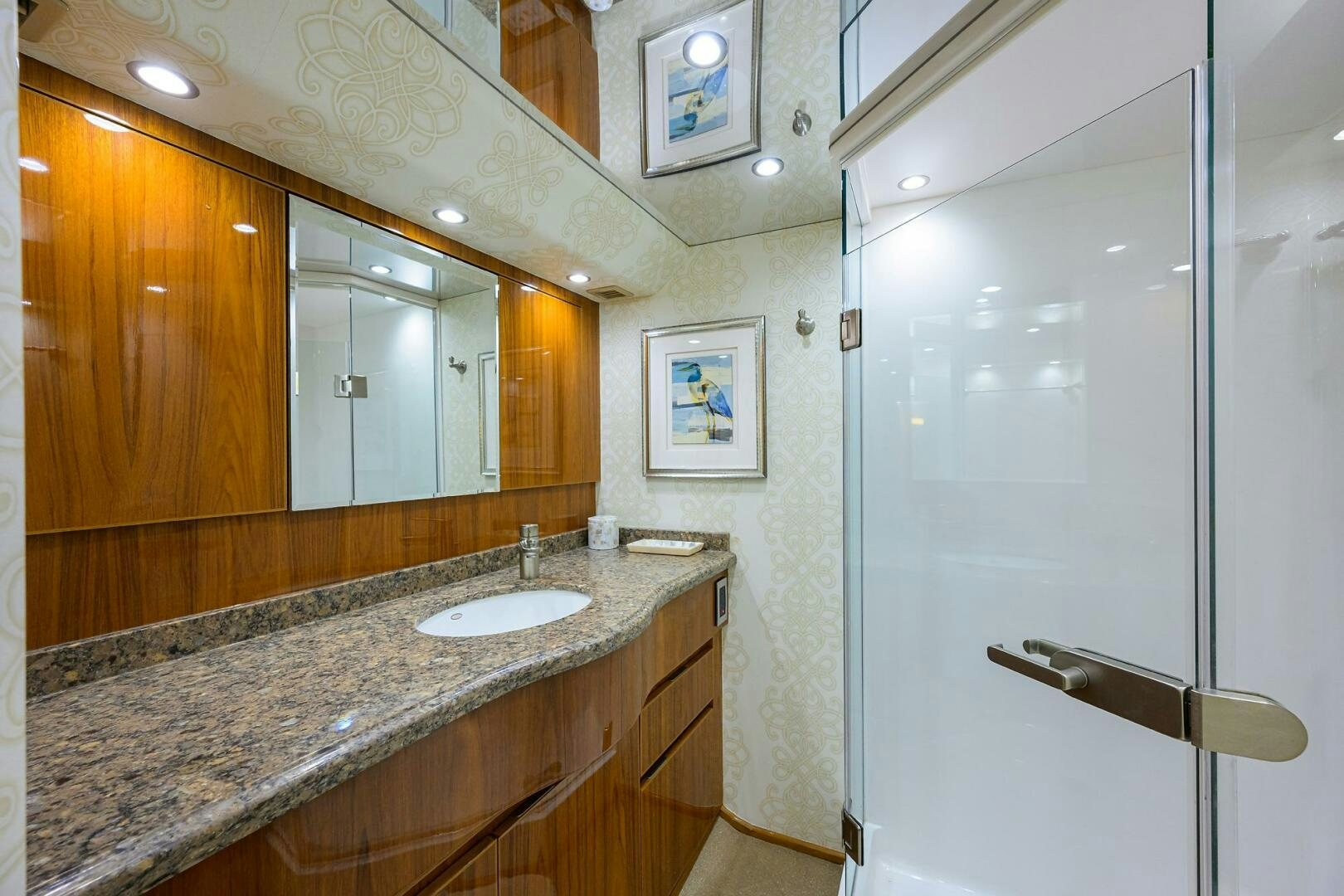 a bathroom with marble counter tops aboard JUST CHILLIN Yacht for Sale