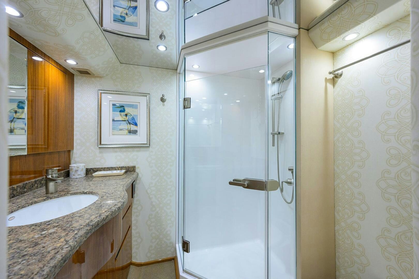 a bathroom with a shower and sink aboard JUST CHILLIN Yacht for Sale