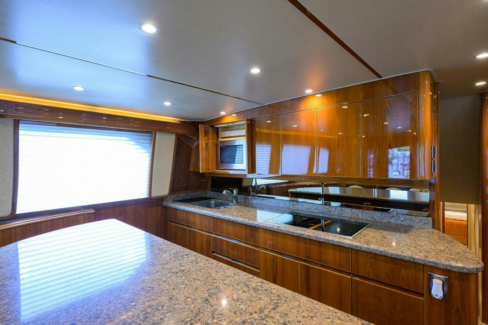 a kitchen with a large island aboard JUST CHILLIN Yacht for Sale