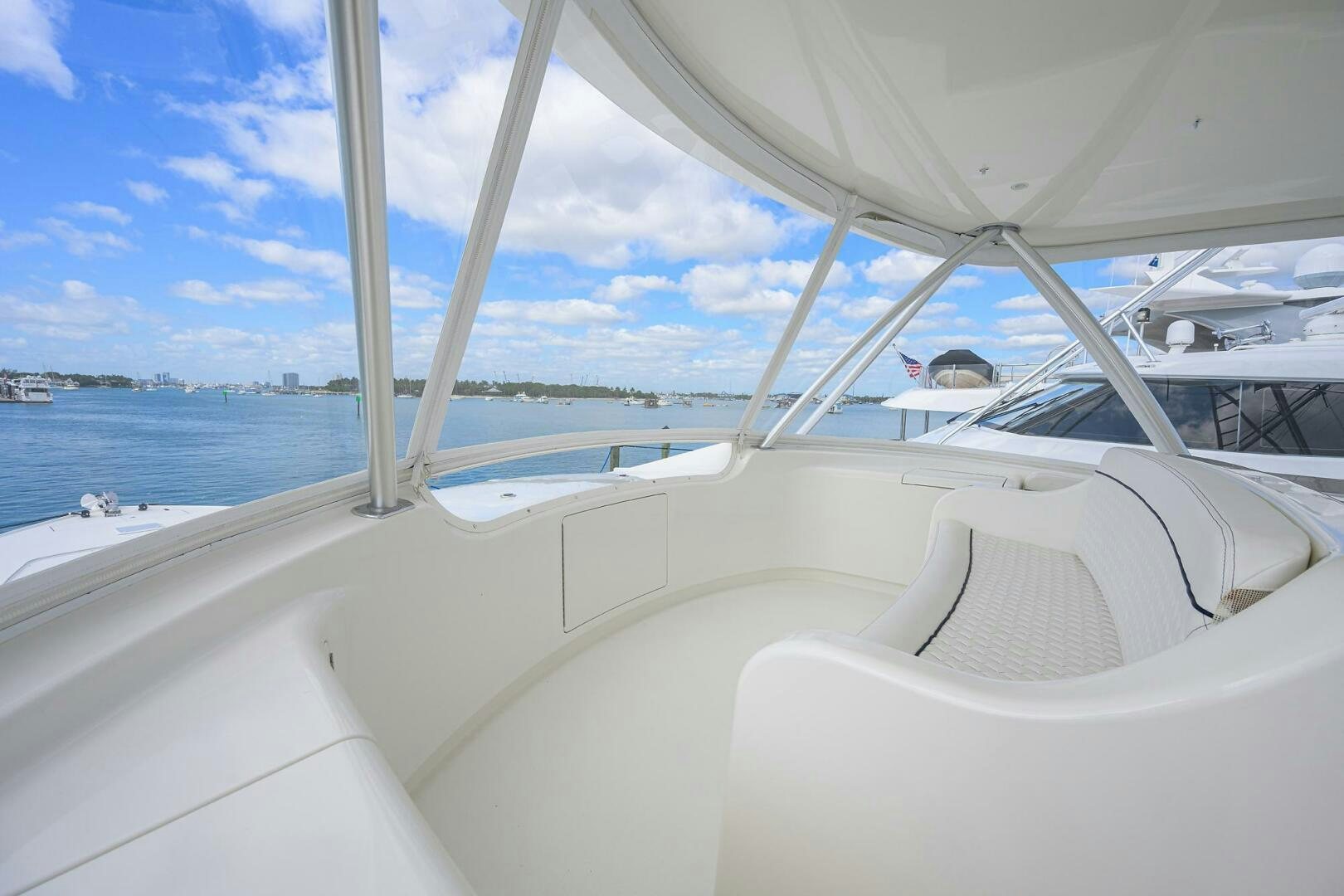 a white boat on the water aboard JUST CHILLIN Yacht for Sale