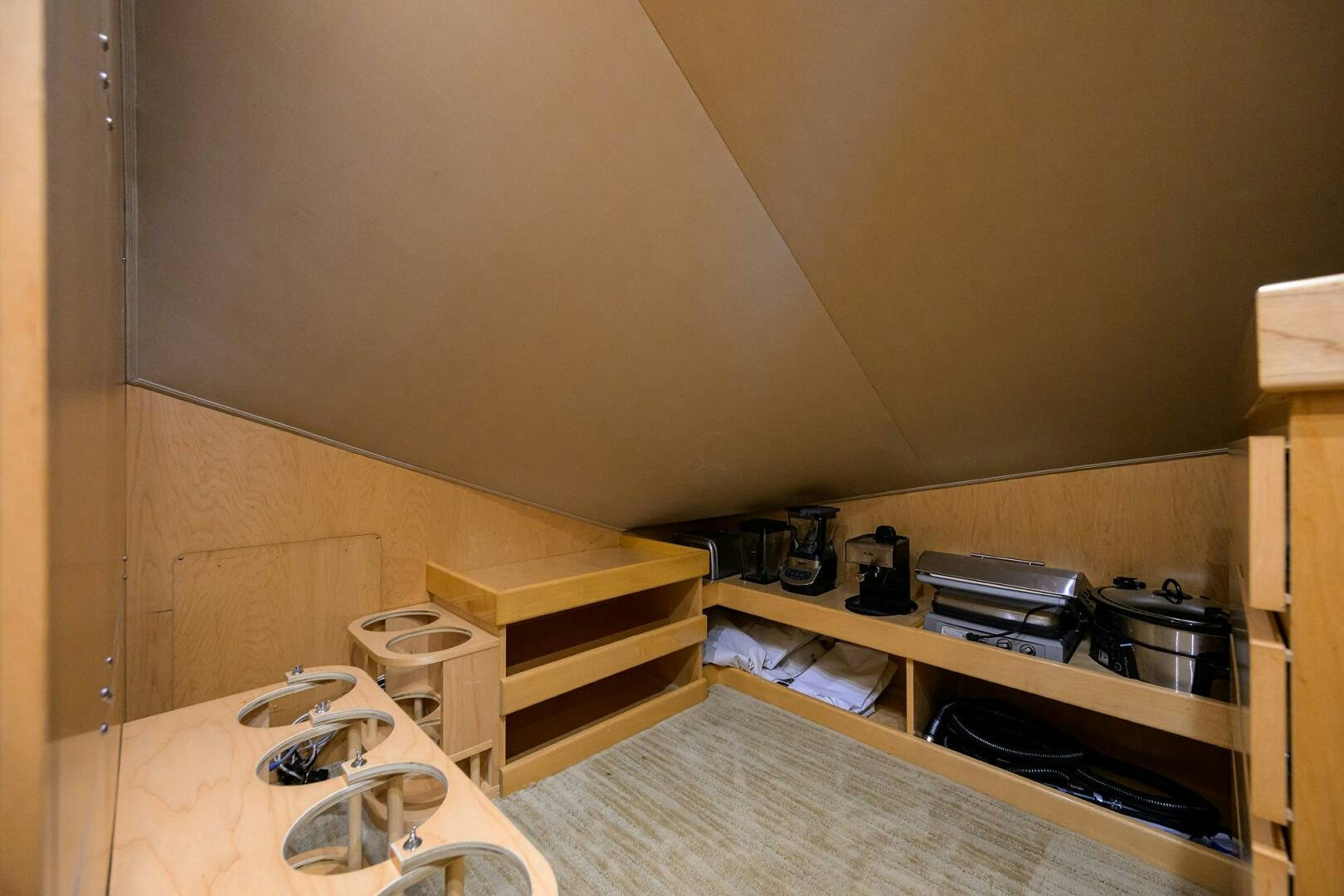 a room with a bed and a desk aboard JUST CHILLIN Yacht for Sale