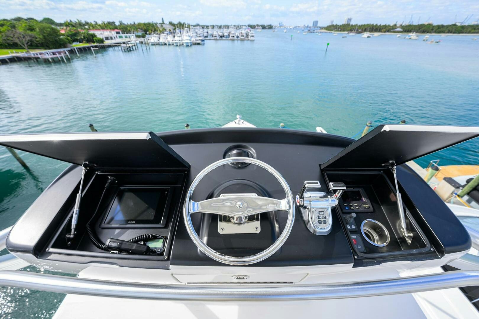 a boat with a steering wheel aboard JUST CHILLIN Yacht for Sale