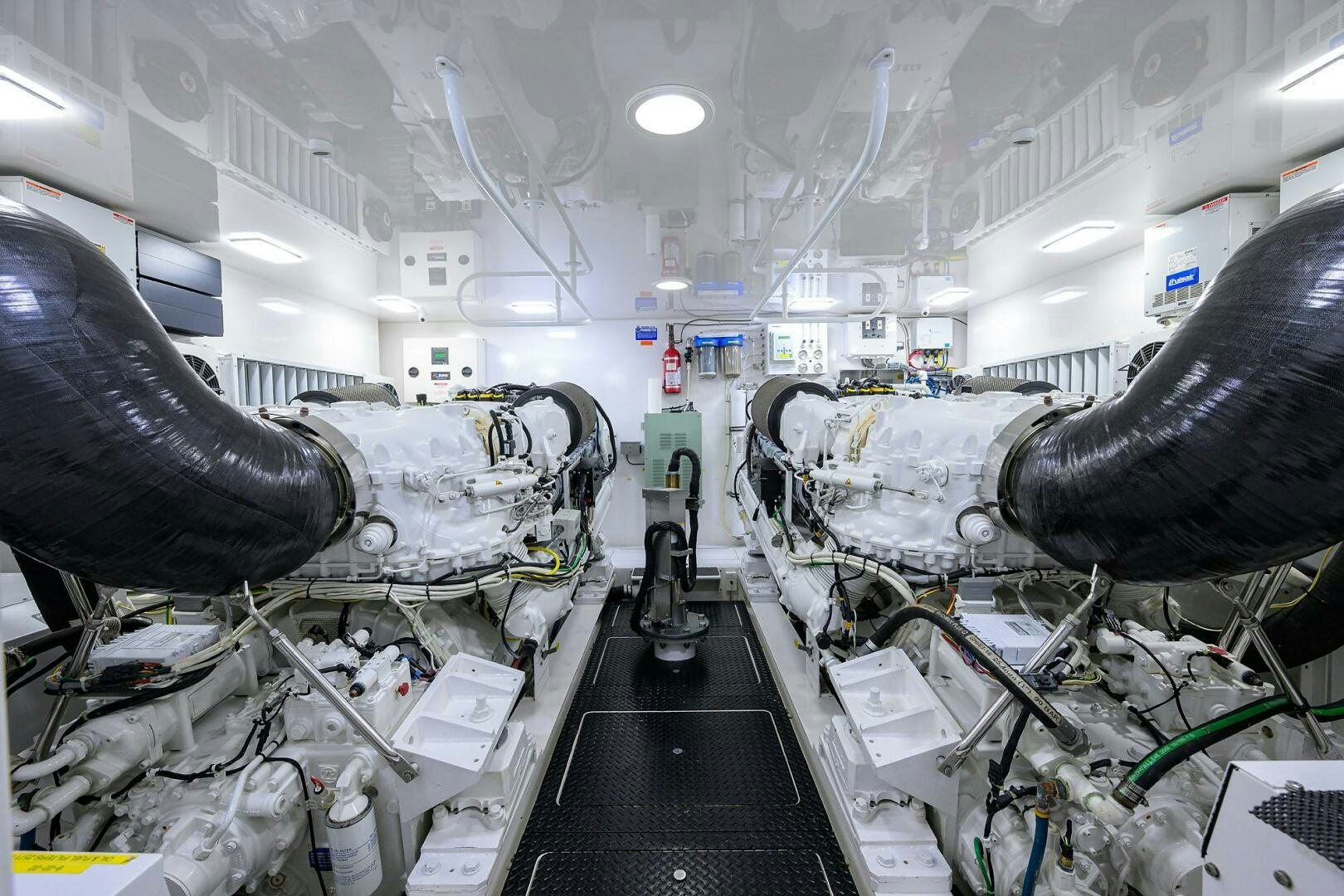 a room with machinery and pipes aboard JUST CHILLIN Yacht for Sale