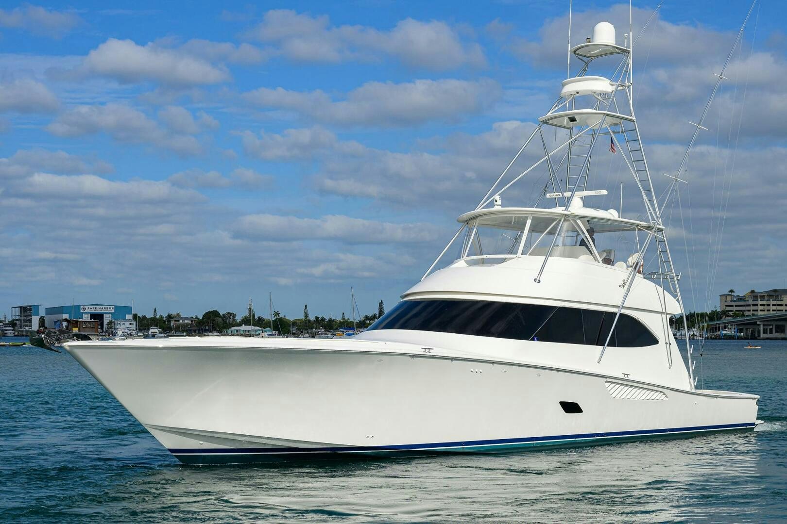 a white yacht on the water aboard JUST CHILLIN Yacht for Sale