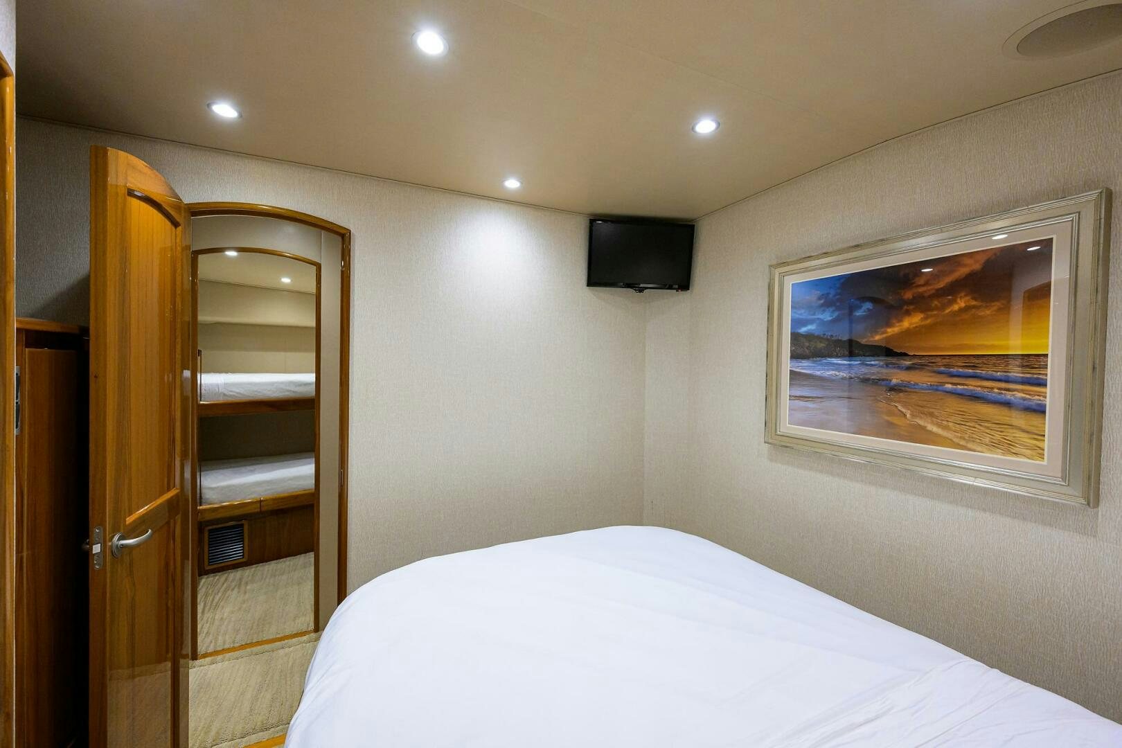 a bed in a room aboard JUST CHILLIN Yacht for Sale