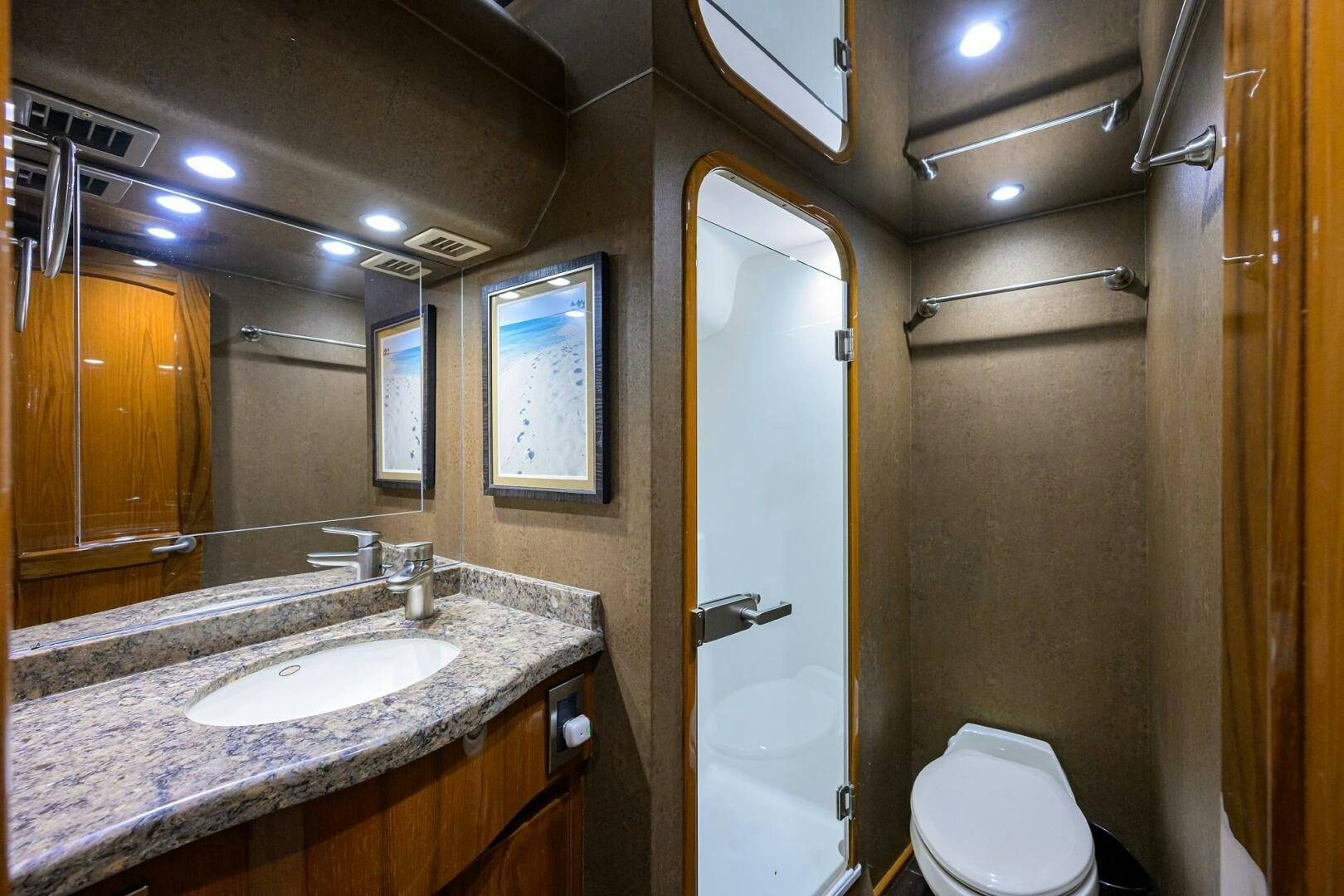 a bathroom with a sink and a mirror aboard JUST CHILLIN Yacht for Sale