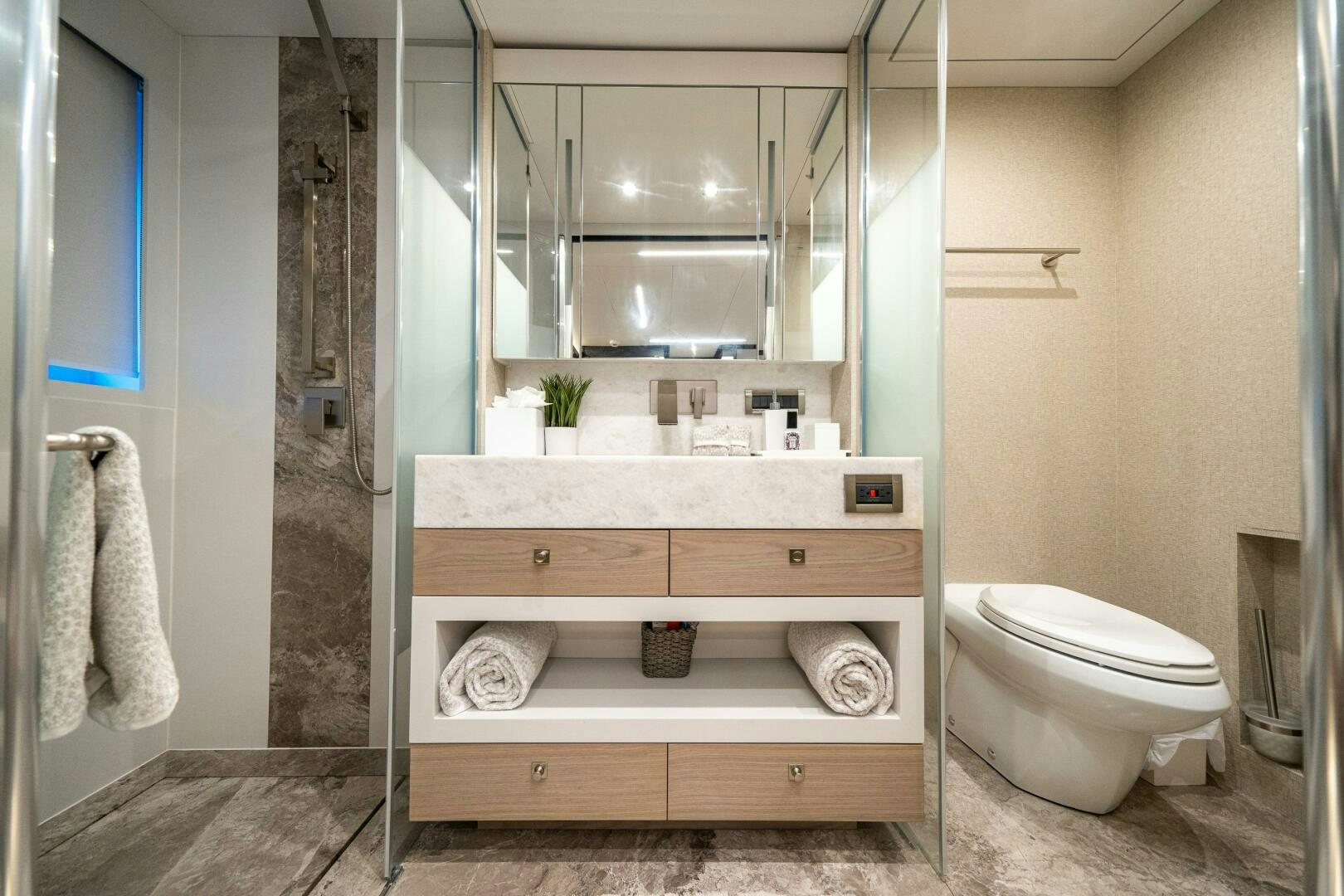 a bathroom with a sink and toilet aboard DAY ONE Yacht for Sale