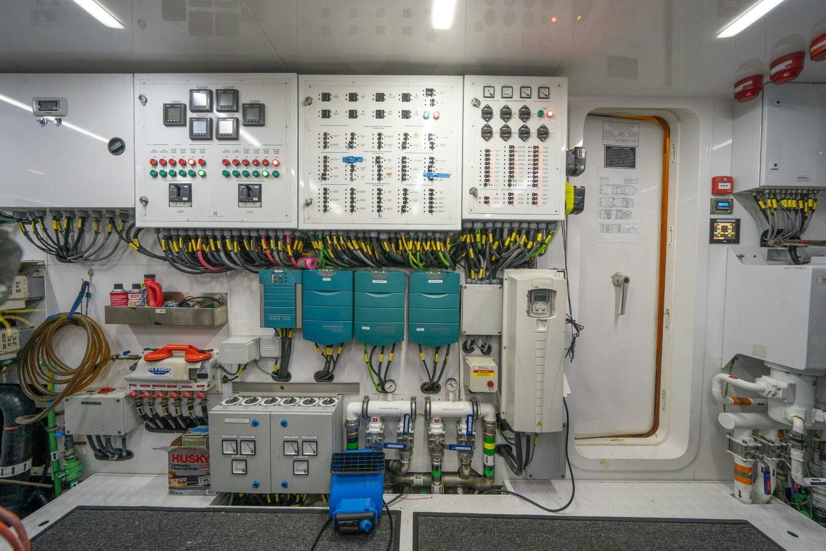 a room with several electrical equipment aboard DAY ONE Yacht for Sale