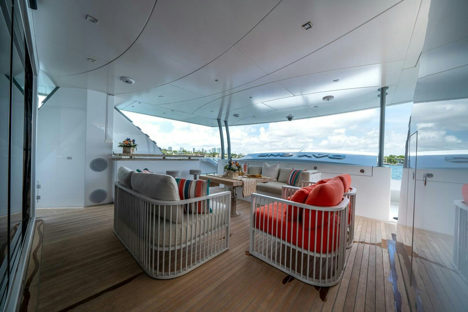 a room with a couch and a chair aboard DAY ONE Yacht for Sale