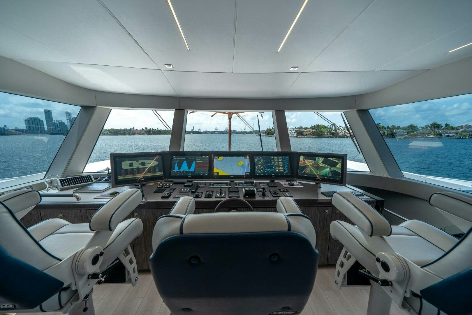inside of a boat with a view of the water and the land below aboard DAY ONE Yacht for Sale