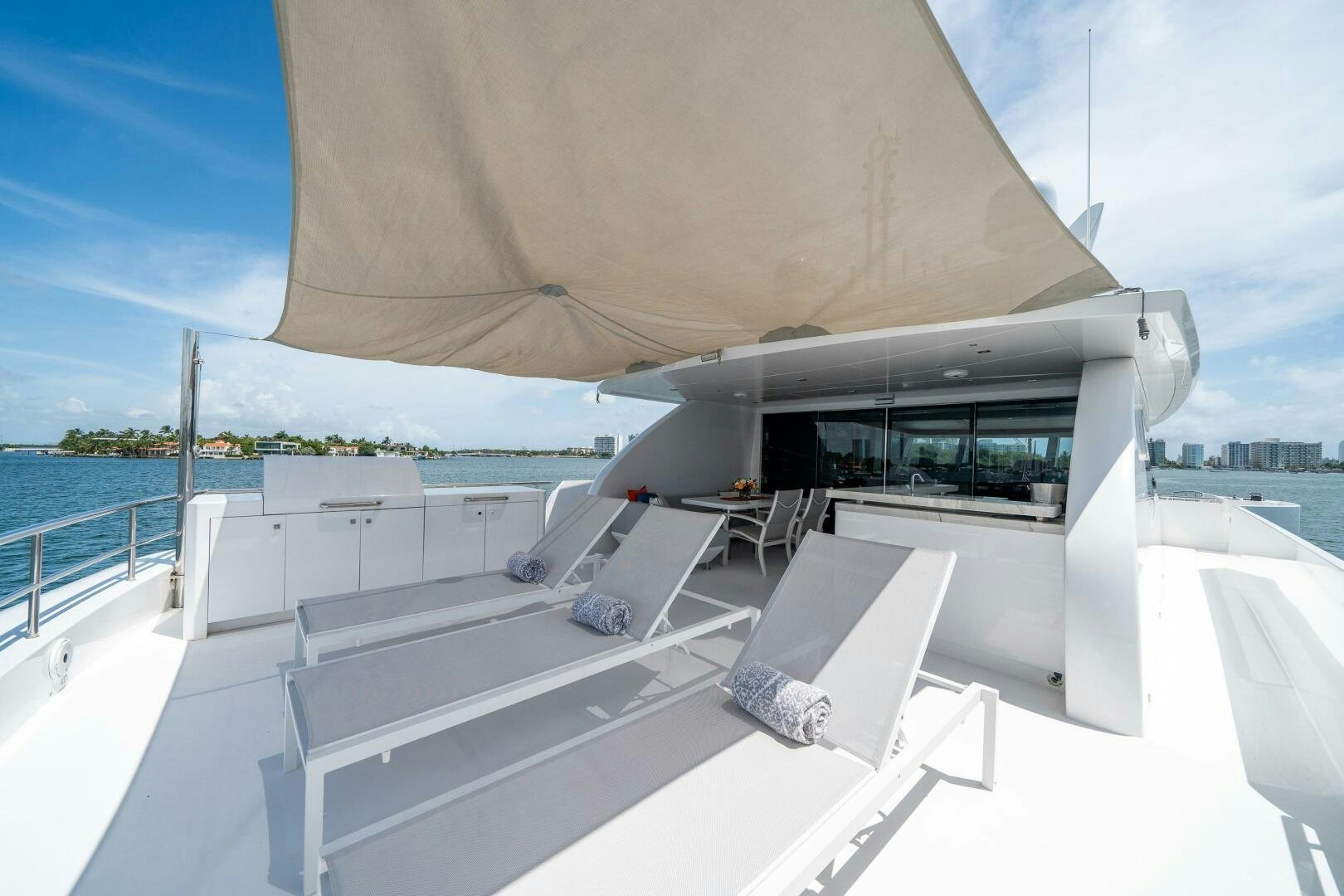 a white building with a large window aboard DAY ONE Yacht for Sale