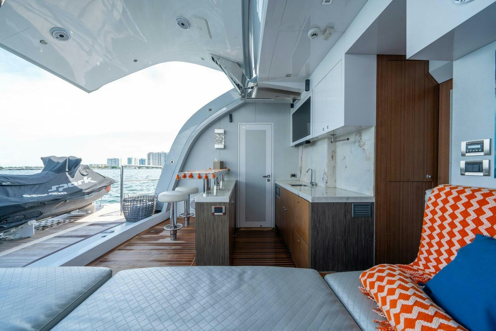 a large room with a bed and a large window aboard DAY ONE Yacht for Sale