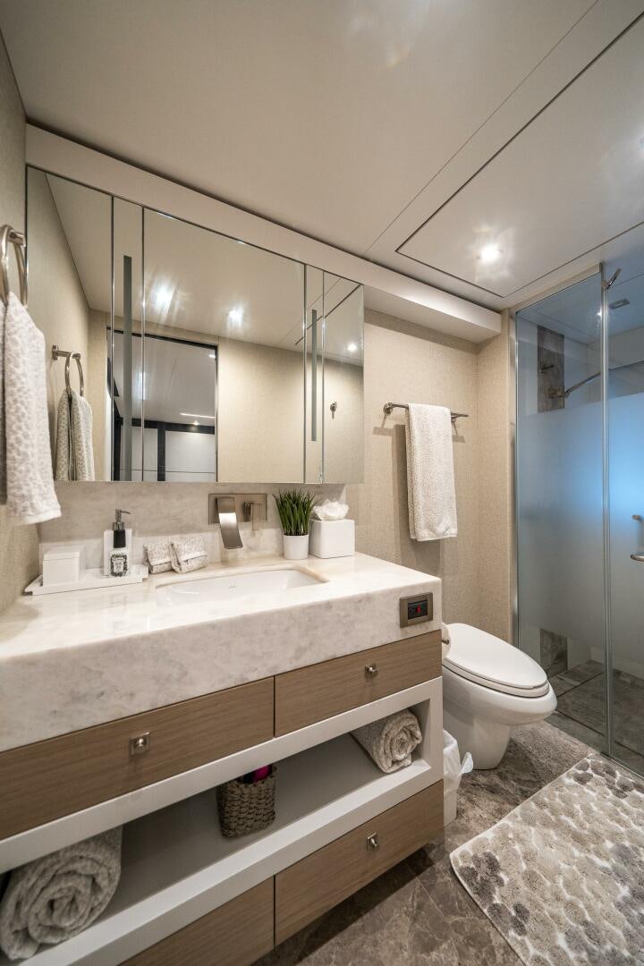 a bathroom with a large mirror aboard DAY ONE Yacht for Sale