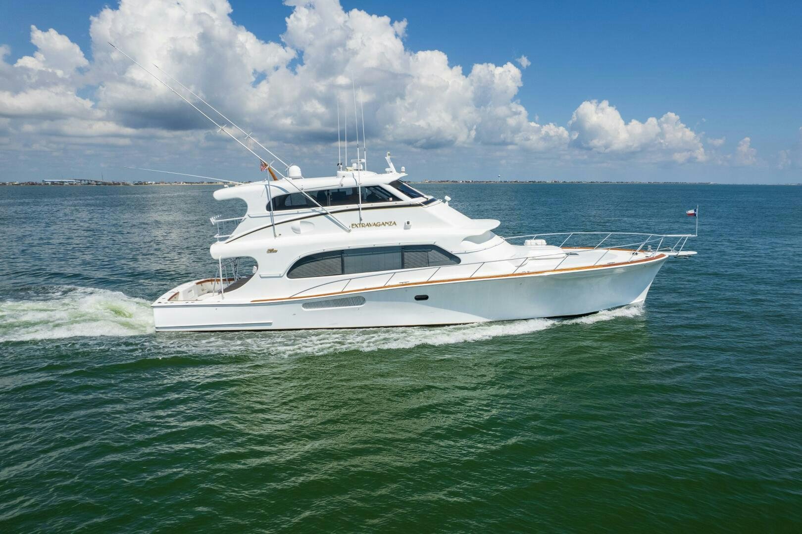 a white boat in the water aboard STRESS RELIEFF  Yacht for Sale