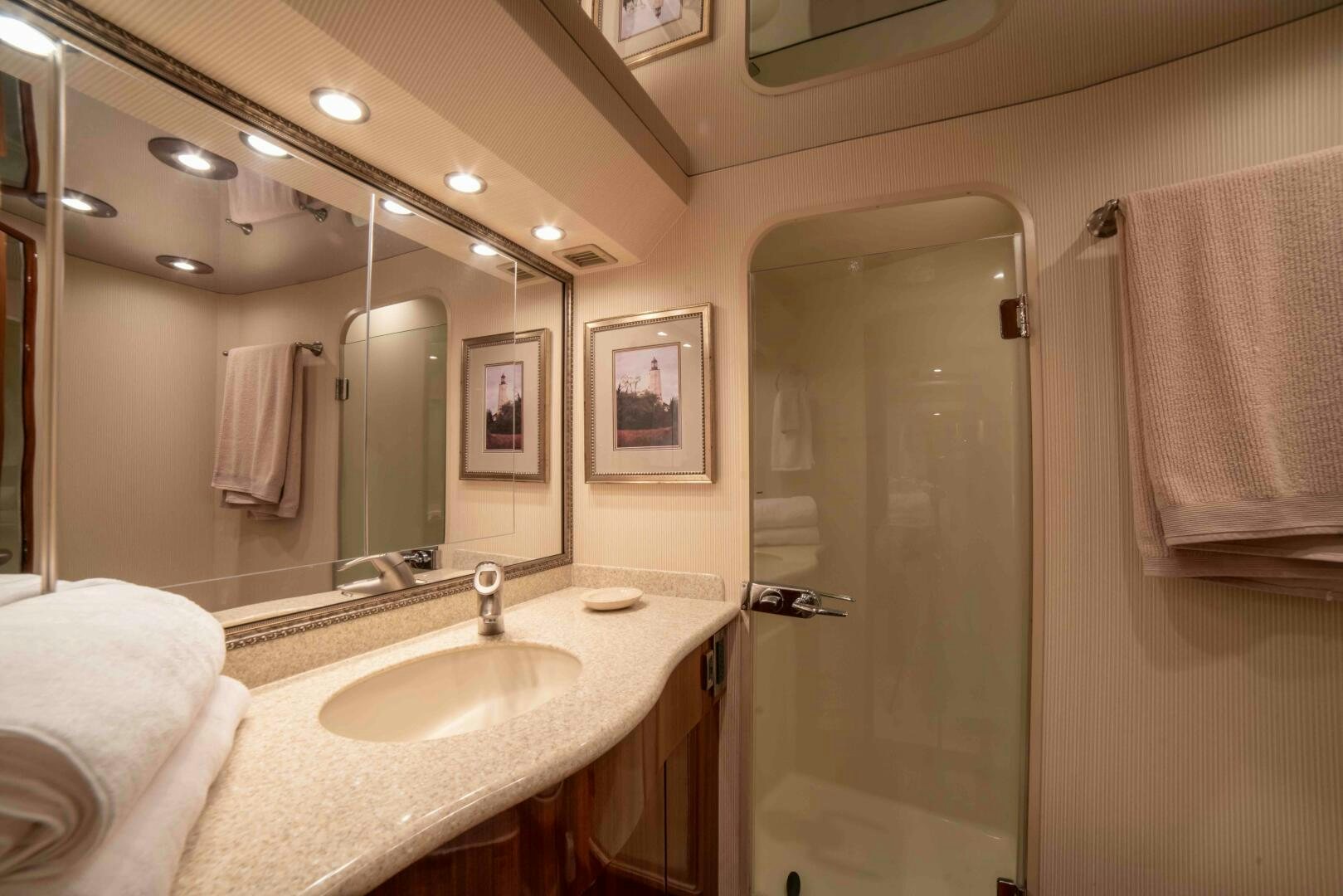 a bathroom with a sink and a shower unit aboard Z MOTIVATION Yacht for Sale