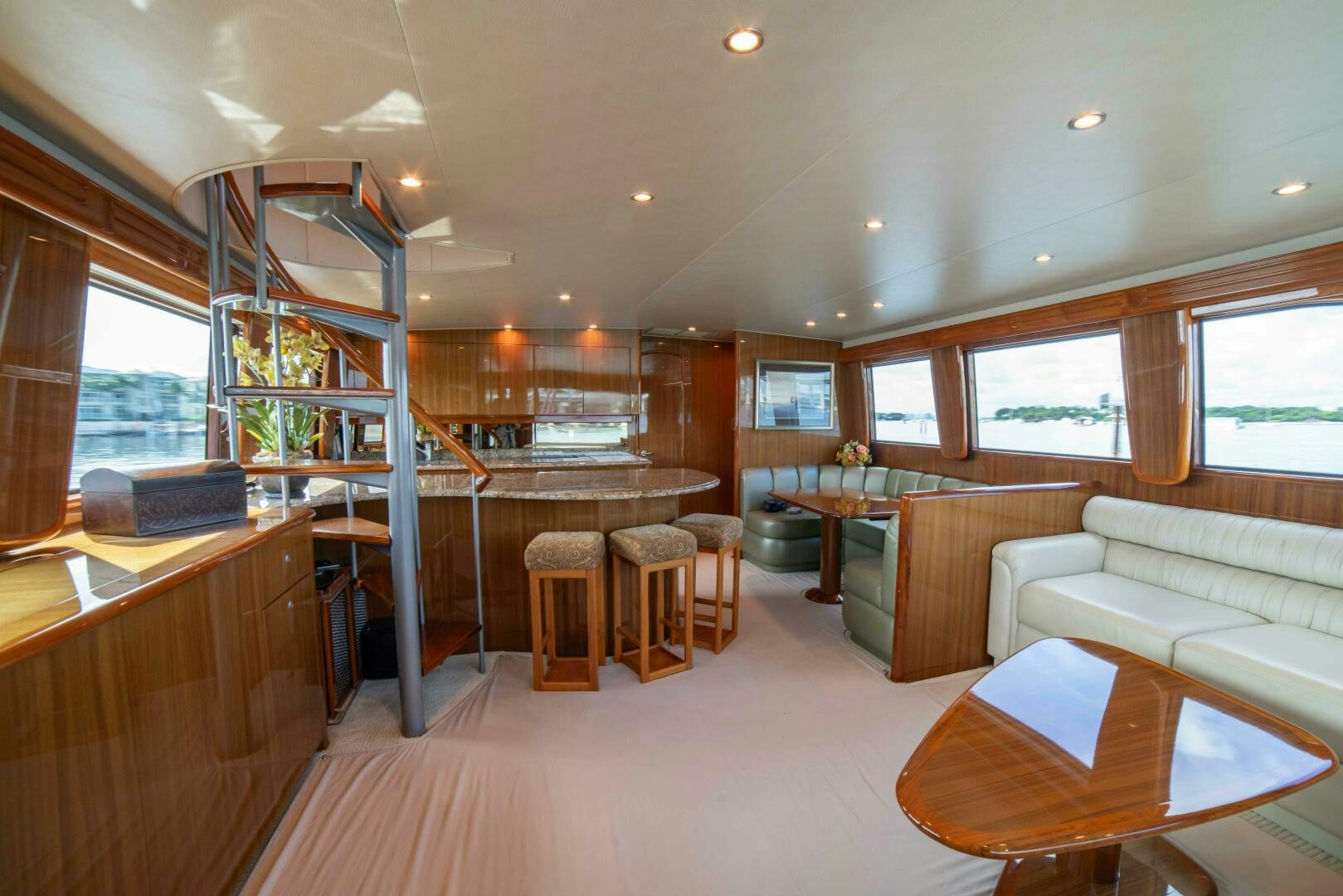 a living room with a ladder aboard Z MOTIVATION Yacht for Sale