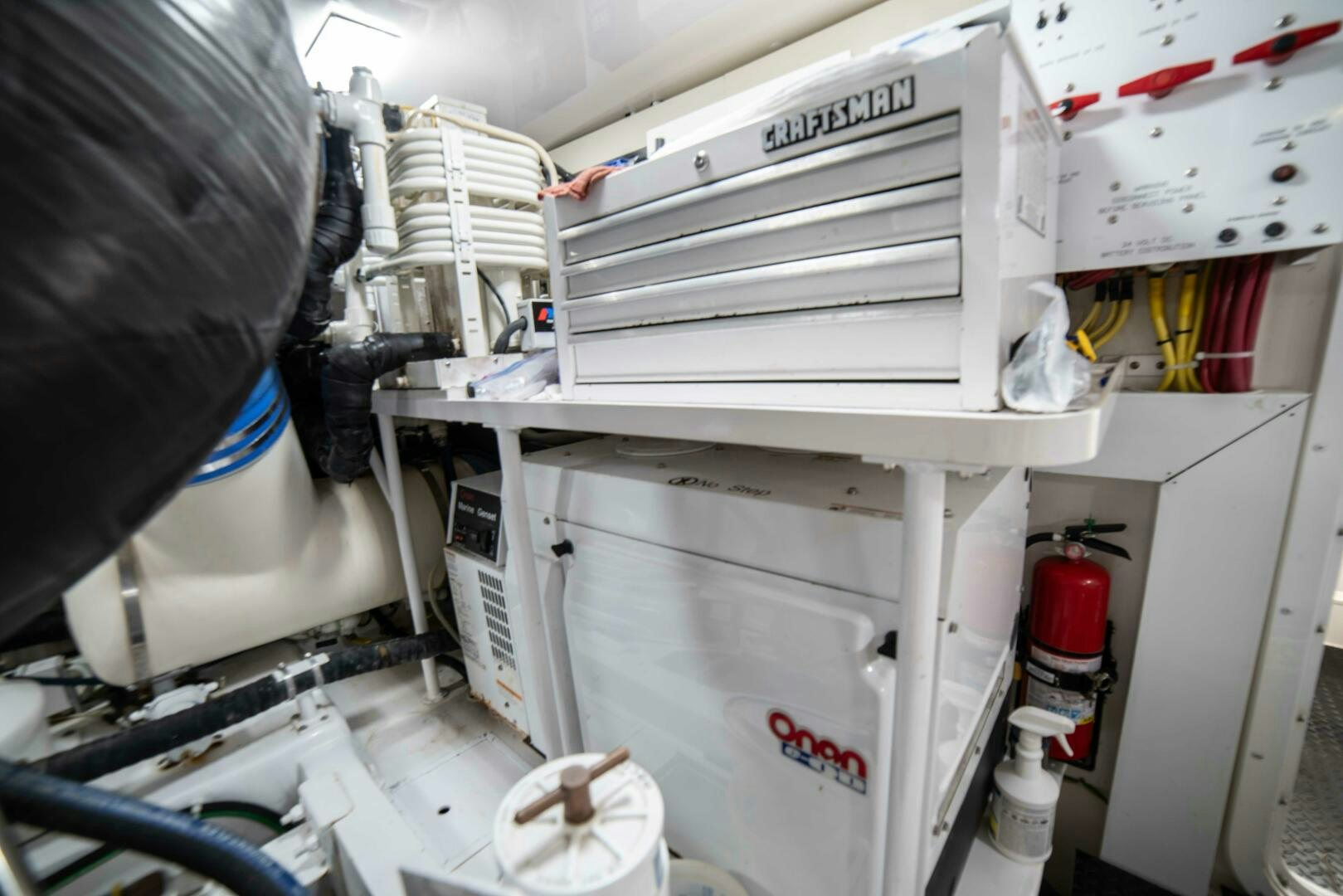 a white machine with a black cap aboard Z MOTIVATION Yacht for Sale