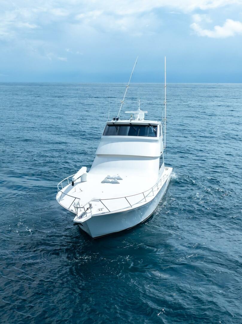 a white boat in the water aboard Z MOTIVATION Yacht for Sale