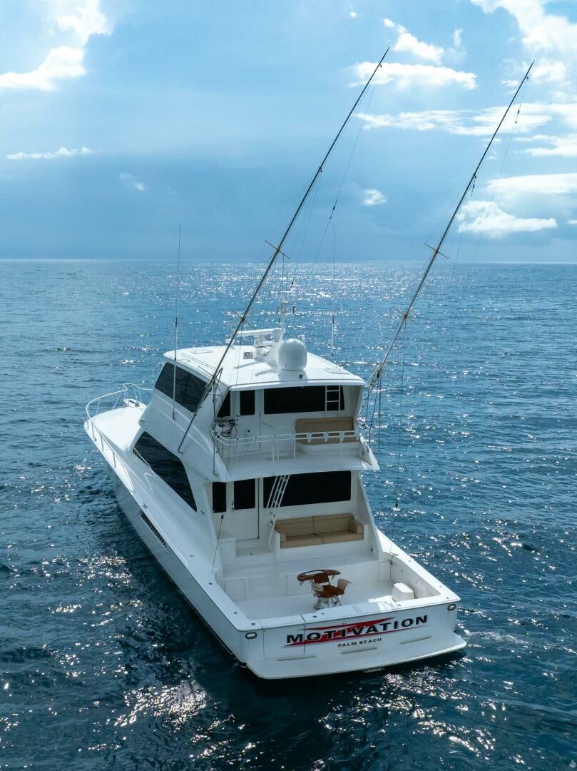 a white boat in the water aboard Z MOTIVATION Yacht for Sale