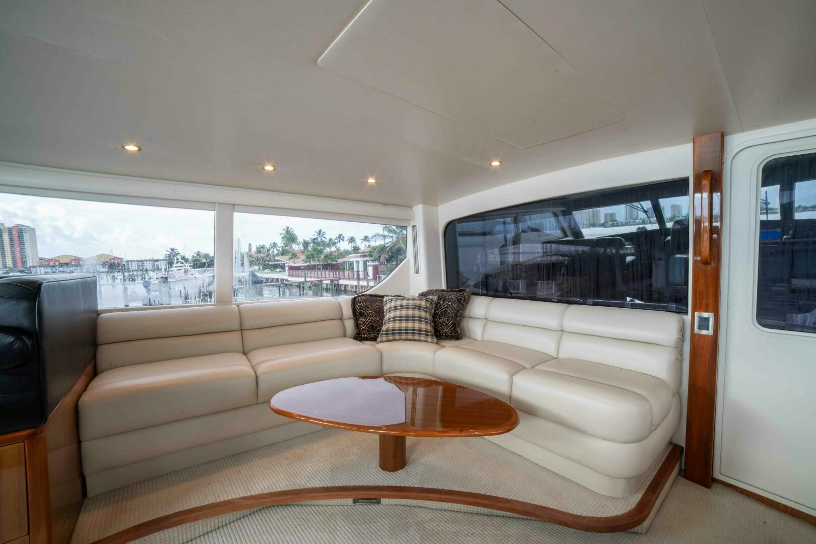 a living room with a couch and a table aboard Z MOTIVATION Yacht for Sale