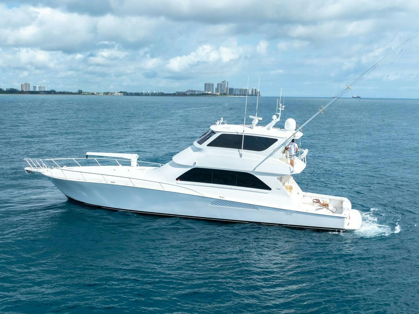 a white boat in the water aboard Z MOTIVATION Yacht for Sale