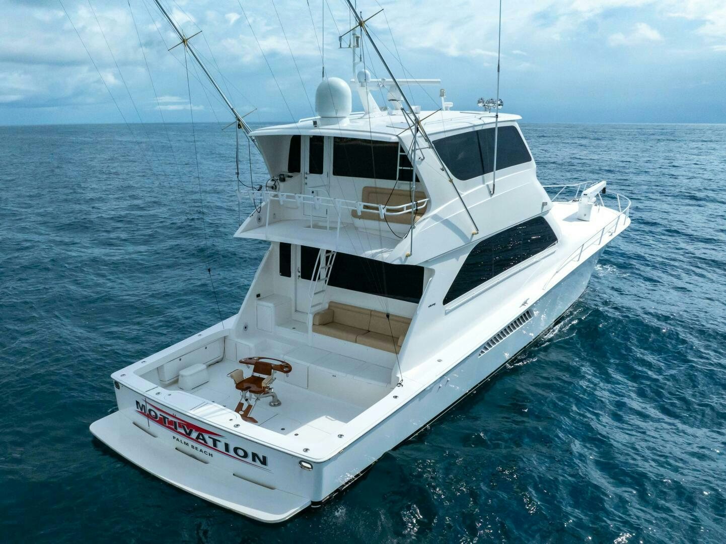 a white boat in the water aboard Z MOTIVATION Yacht for Sale