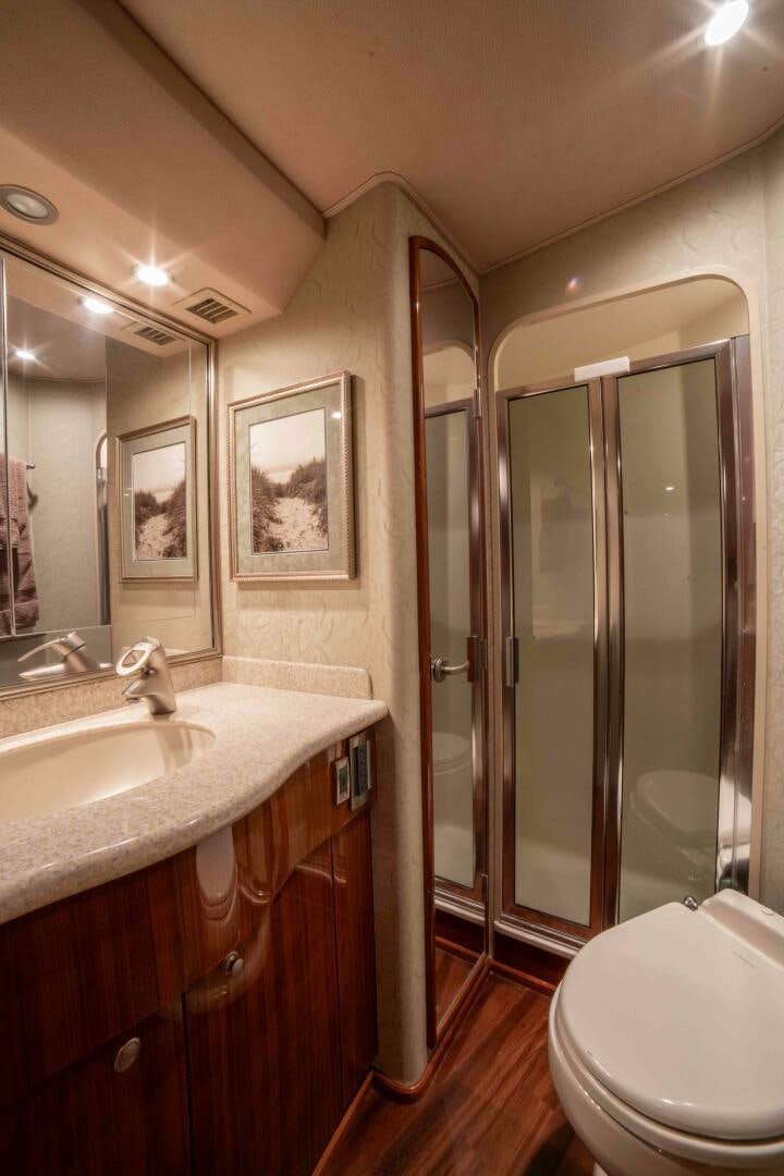 a bathroom with a sink and a toilet aboard Z MOTIVATION Yacht for Sale