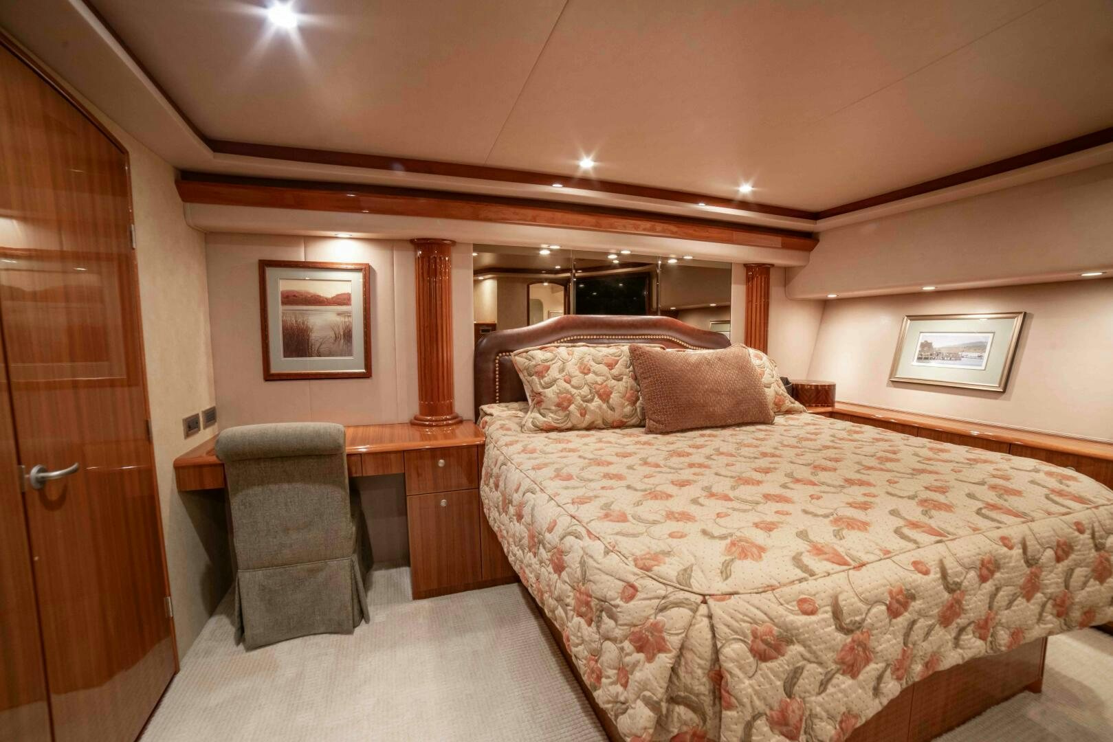 a bedroom with a bed and a desk aboard Z MOTIVATION Yacht for Sale