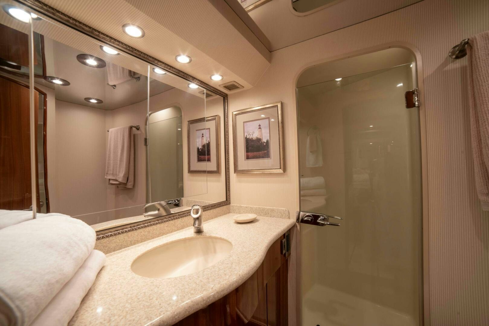 a bathroom with a large mirror aboard Z MOTIVATION Yacht for Sale