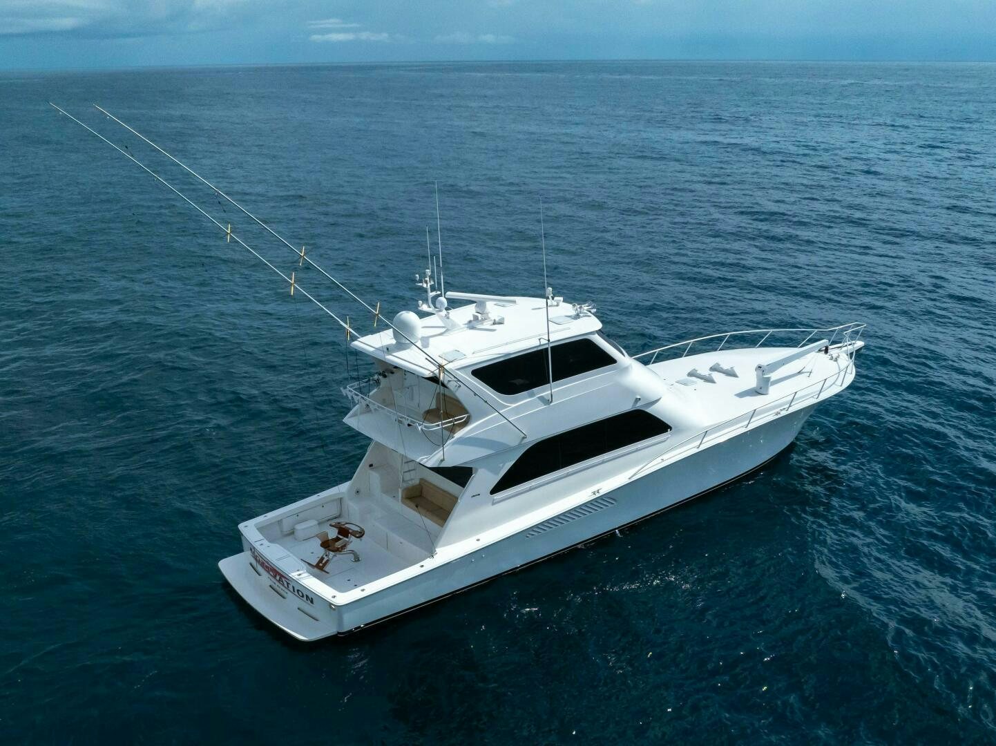 a white yacht in the ocean aboard Z MOTIVATION Yacht for Sale