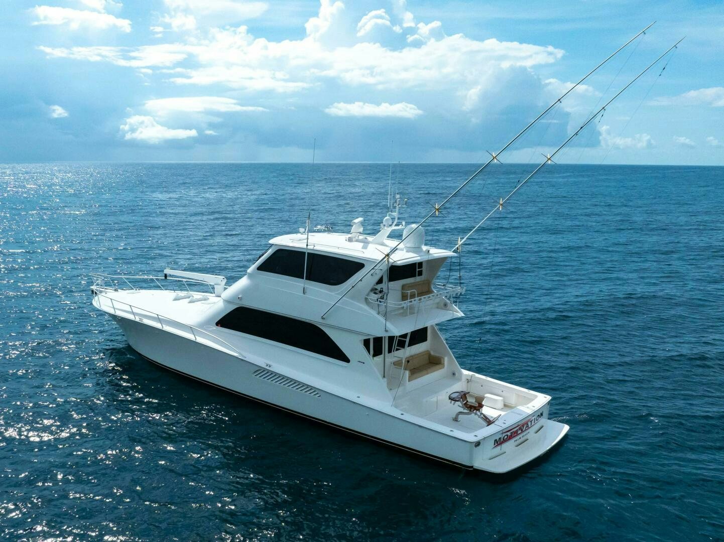 a white boat in the water aboard Z MOTIVATION Yacht for Sale