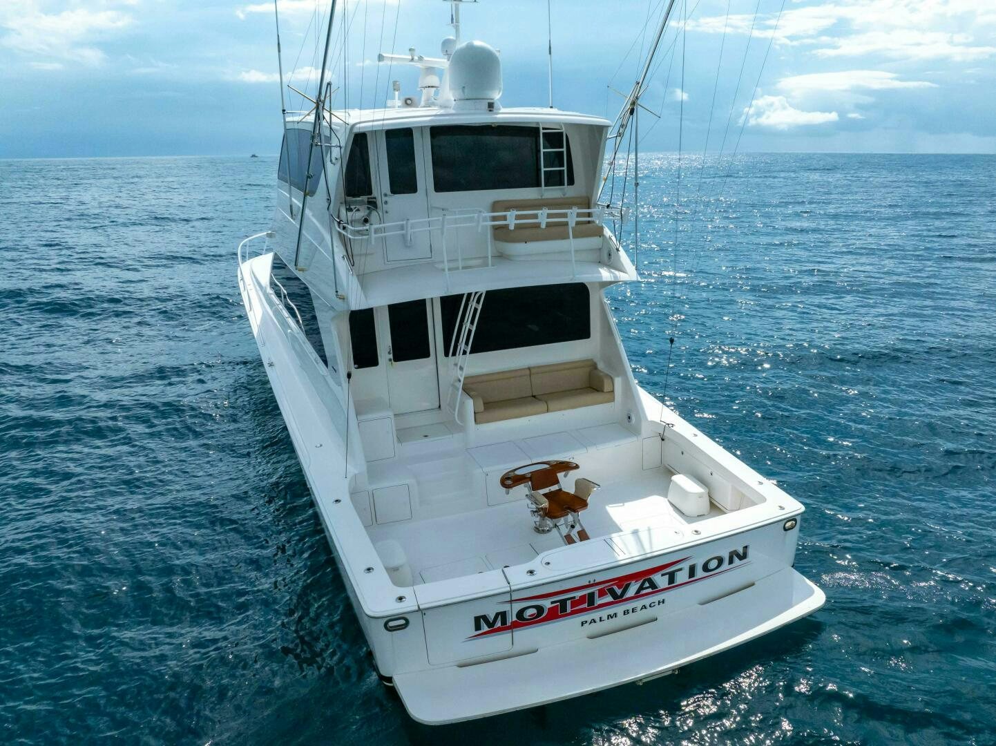 a white boat in the water aboard Z MOTIVATION Yacht for Sale