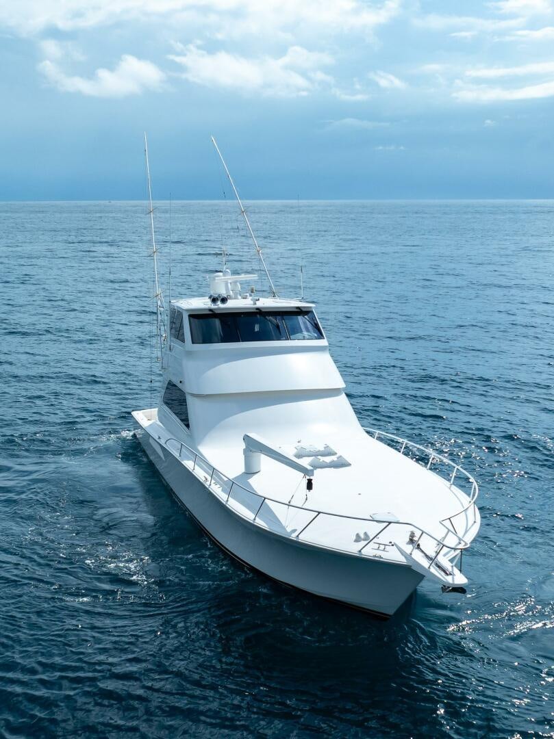 a white boat in the water aboard Z MOTIVATION Yacht for Sale