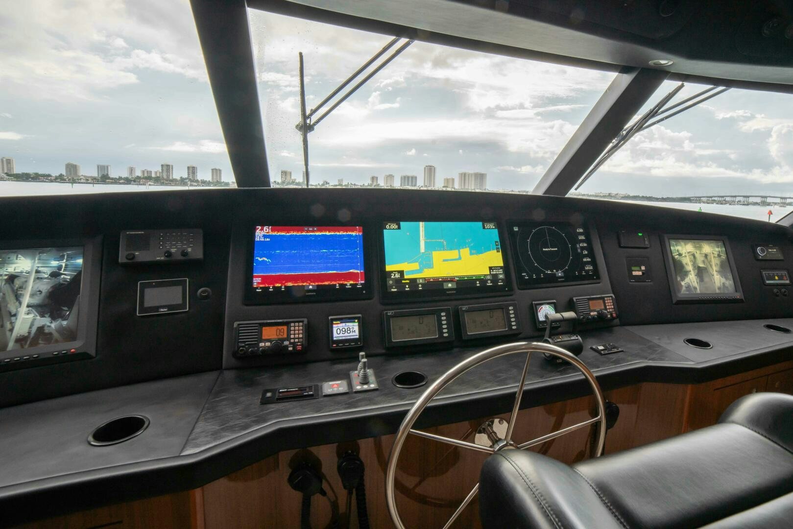 a group of monitors on a table aboard Z MOTIVATION Yacht for Sale