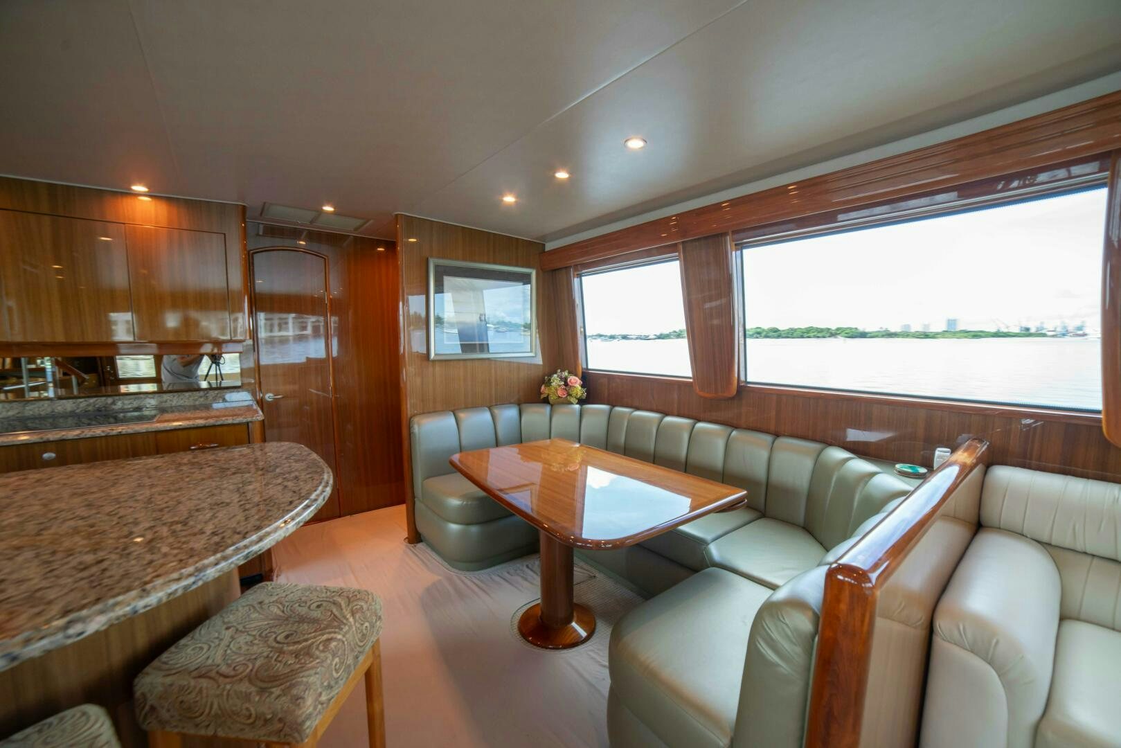 a living room with a couch and a table aboard Z MOTIVATION Yacht for Sale