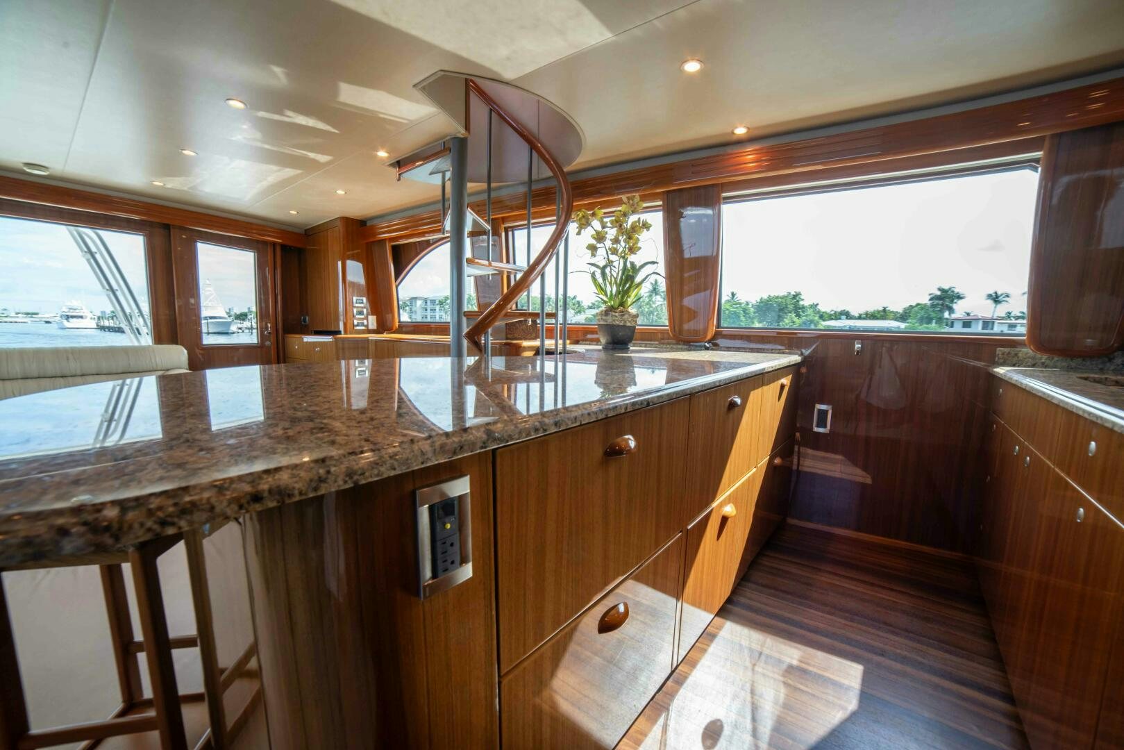 a kitchen with wooden cabinets aboard Z MOTIVATION Yacht for Sale