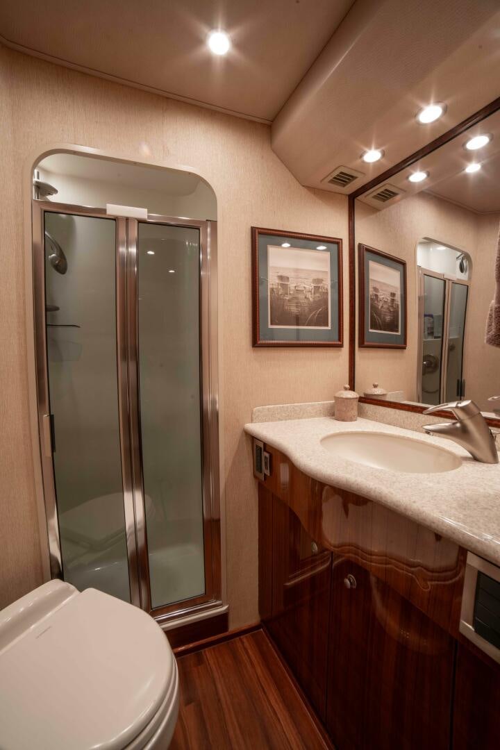 a bathroom with a glass shower aboard Z MOTIVATION Yacht for Sale