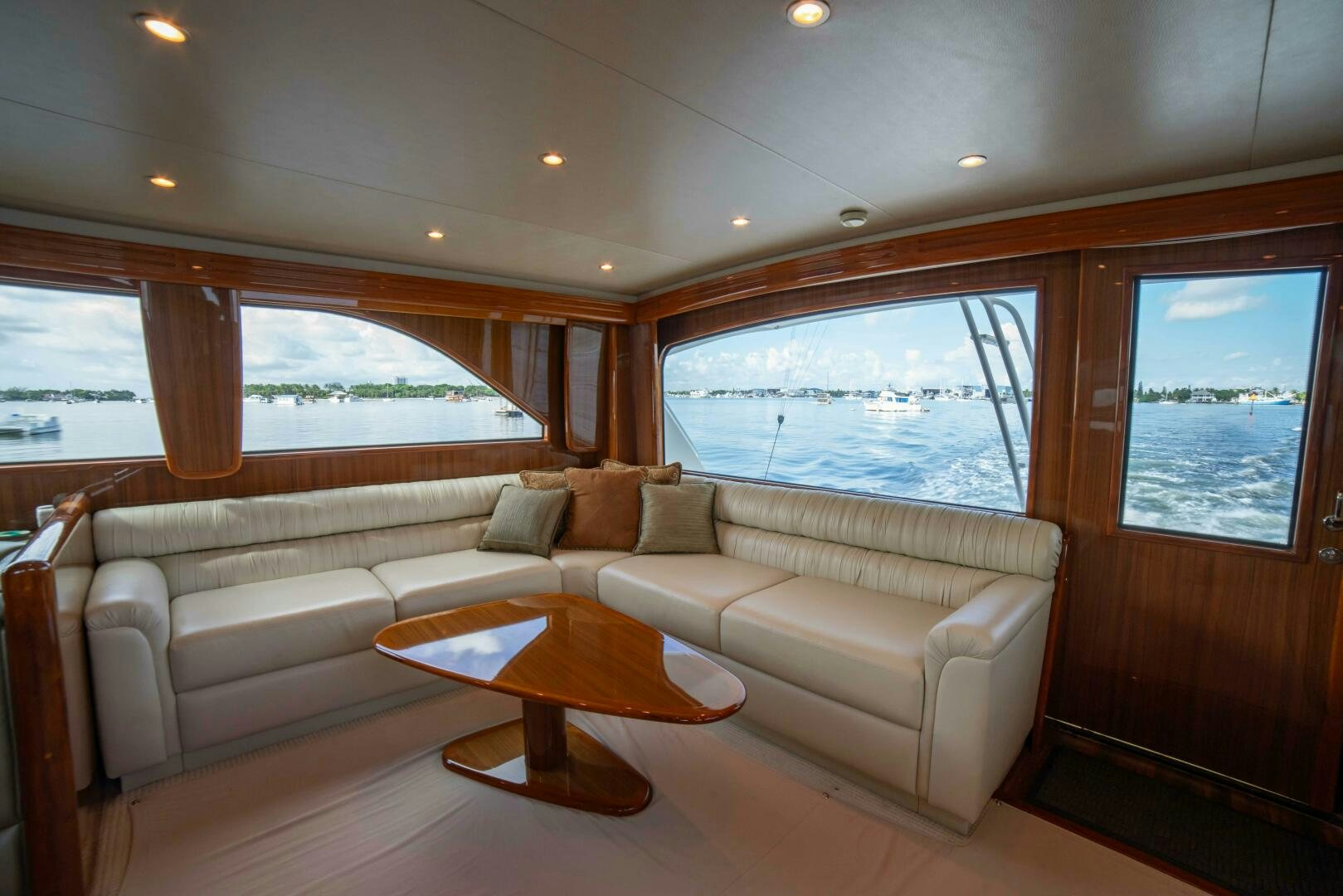 a living room with a couch and a table aboard Z MOTIVATION Yacht for Sale