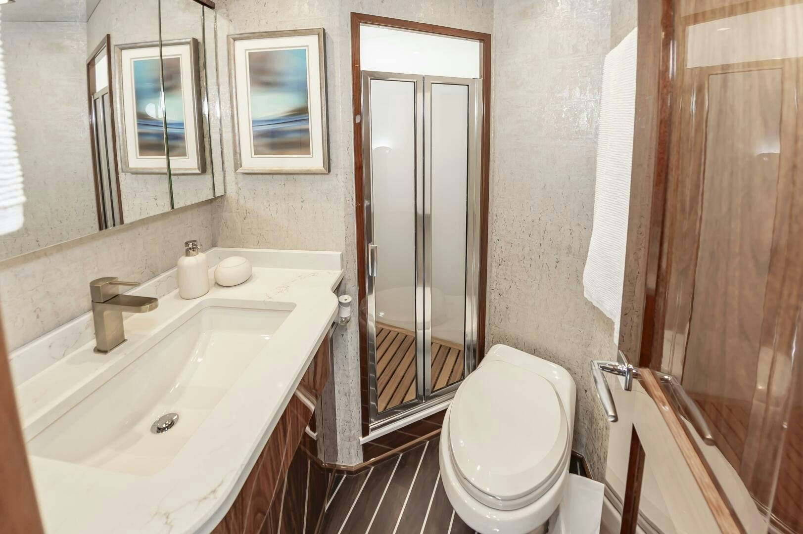 a bathroom with a toilet sink and a bathtub aboard MERCENARIA Yacht for Sale